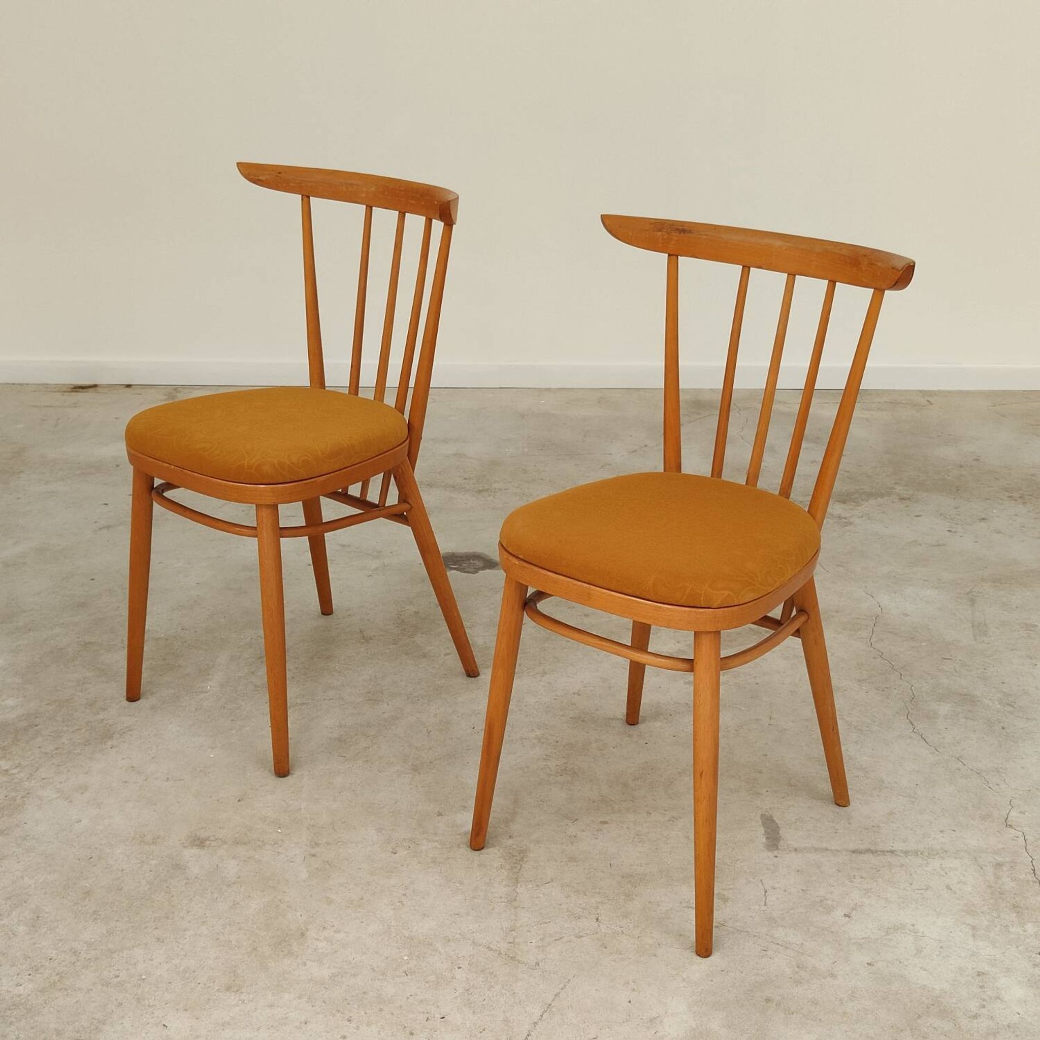Pair of wooden dining room chairs by Tatra Pravenec 1960