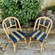 Six "Maison Drucker" chairs in rattan and satin fibers.