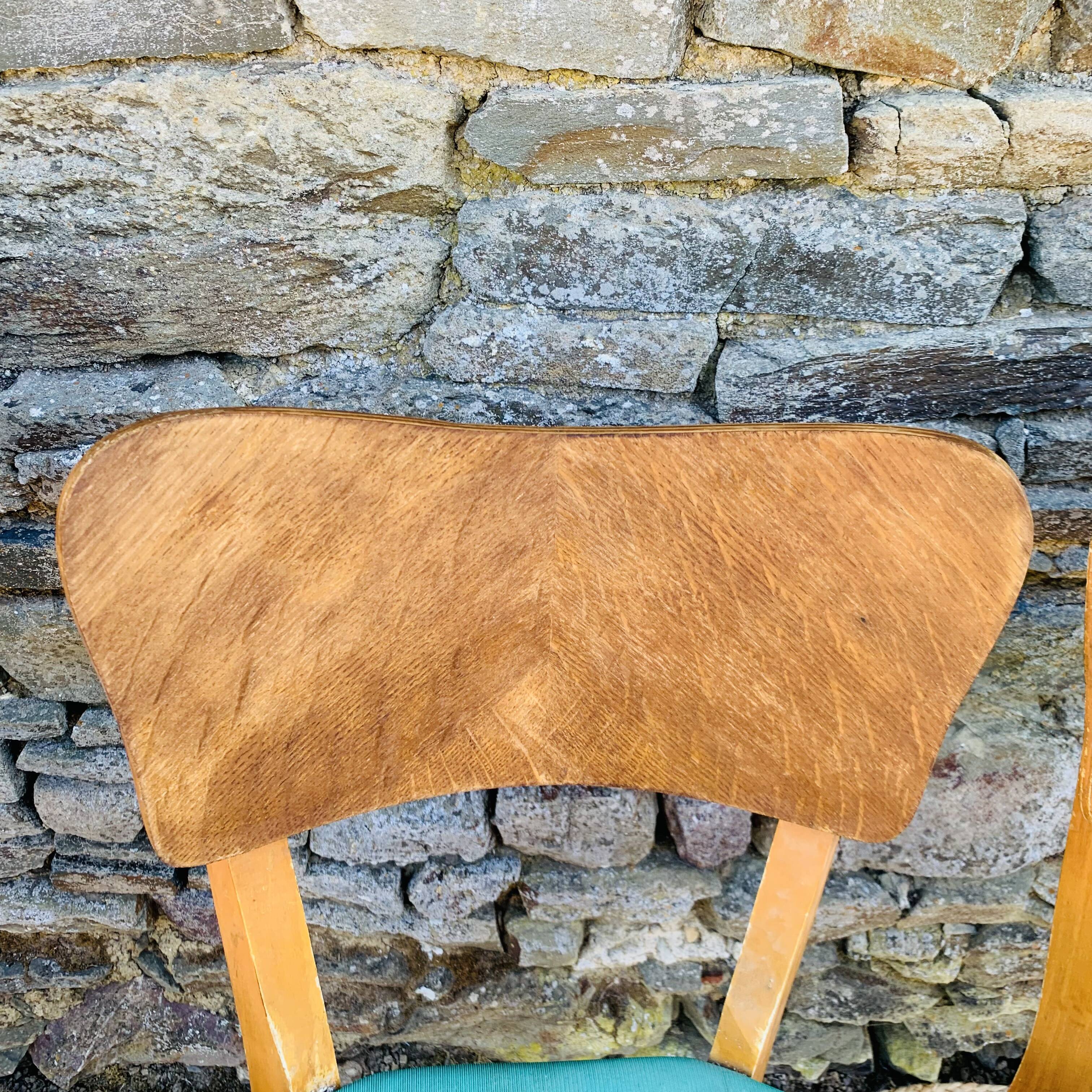 Set of 4 vinyl and wood chairs