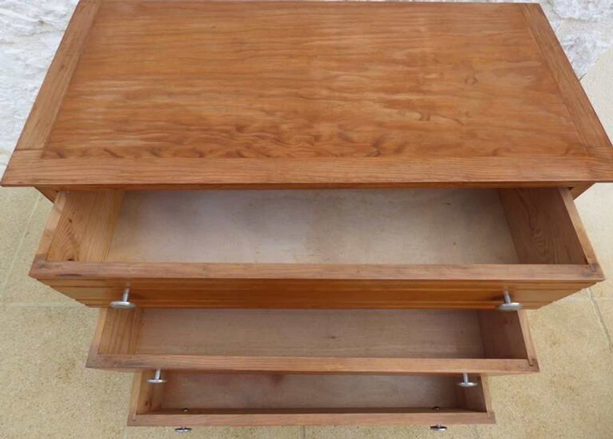 Antique post art deco chest of drawers circa 1940 in solid pine wood in its patina