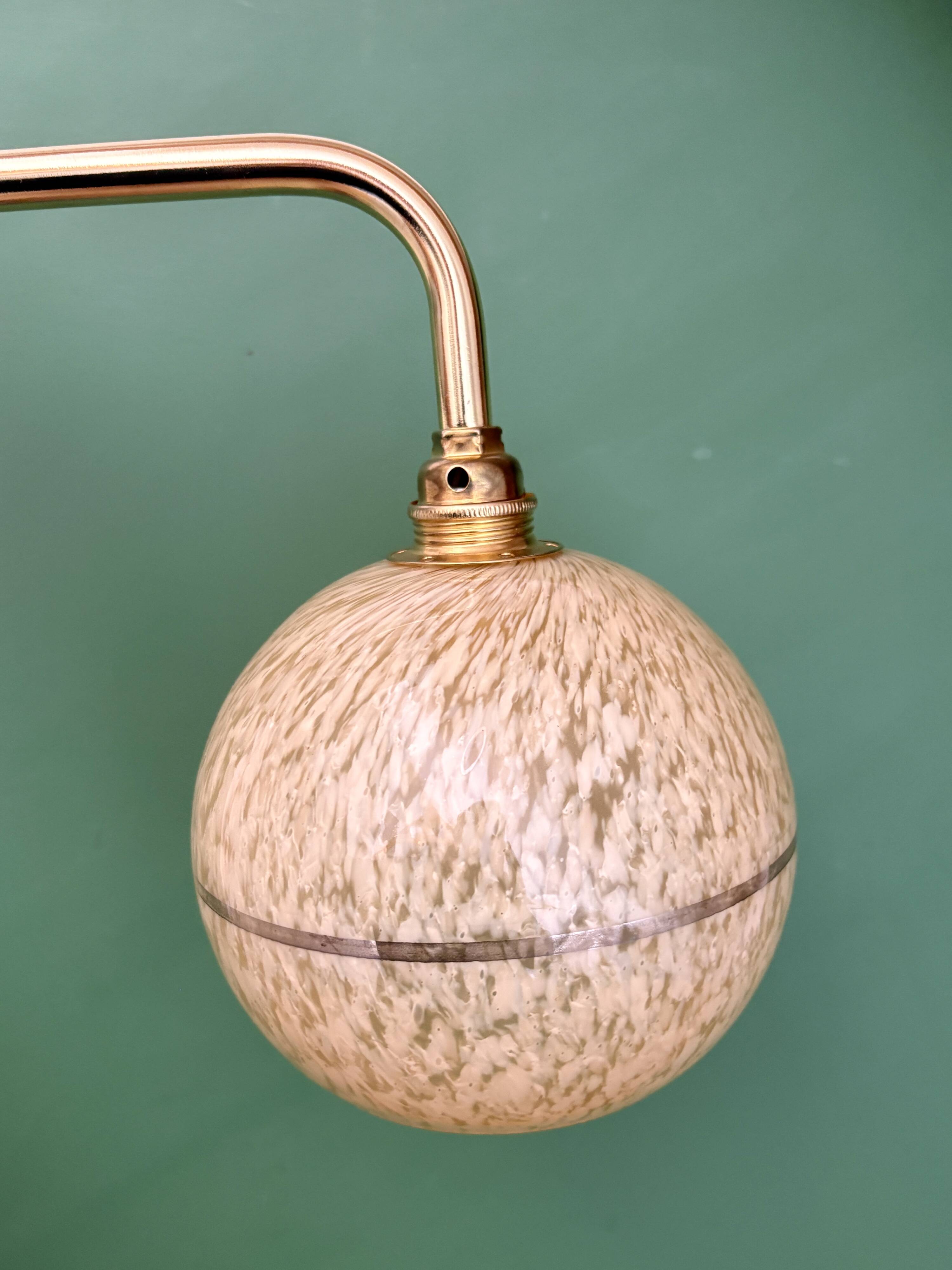 Vintage glass globe wall light in yellow and silver from Clichy.
