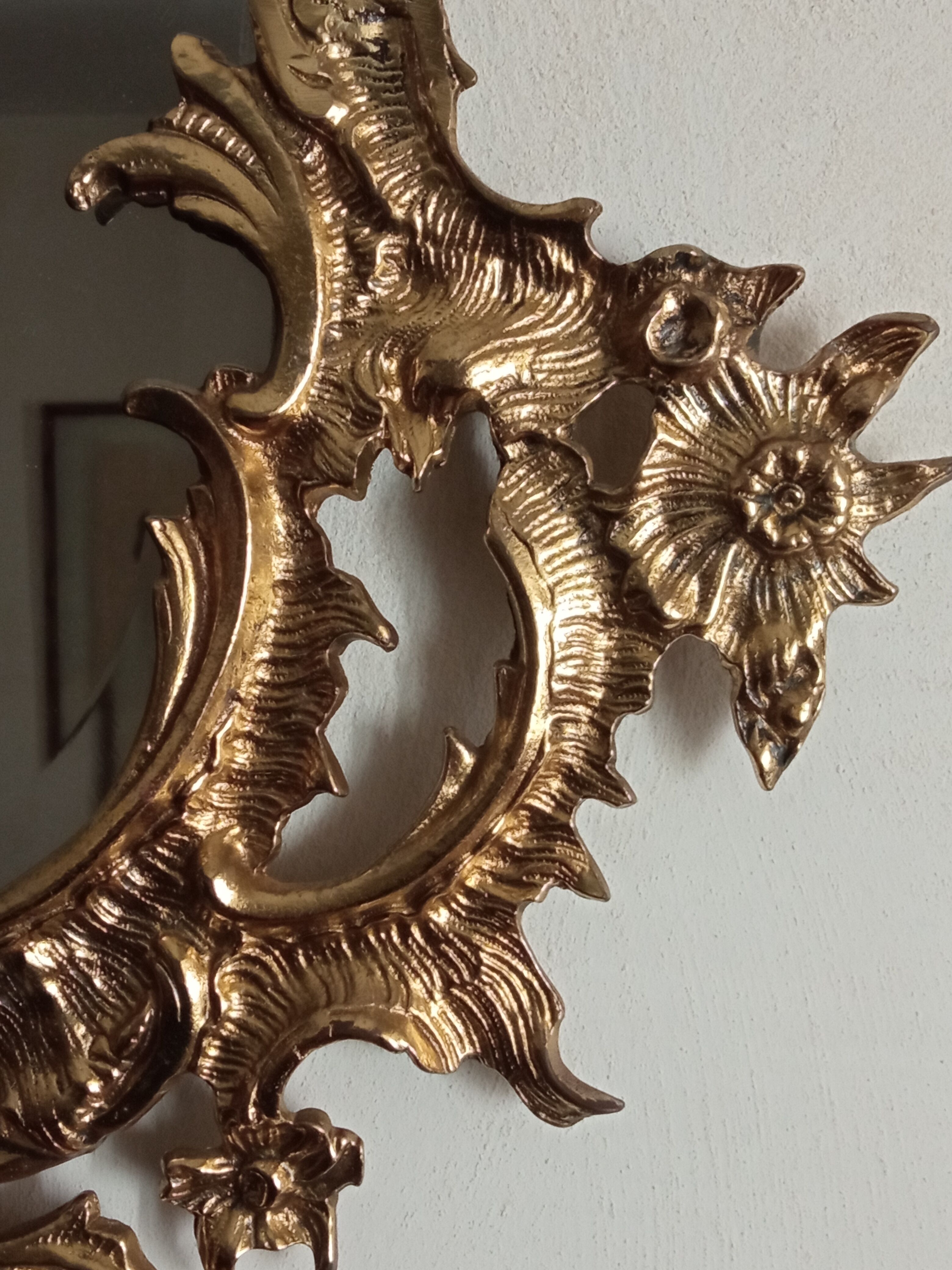Antique mirror in gilded metal