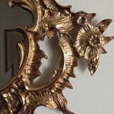 Antique mirror in gilded metal