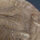 Médaillon tondo en plâtre patiné femme et putti Fin XIXème