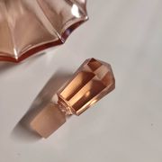Vintage Art Deco perfume bottle in beautiful pink glass.