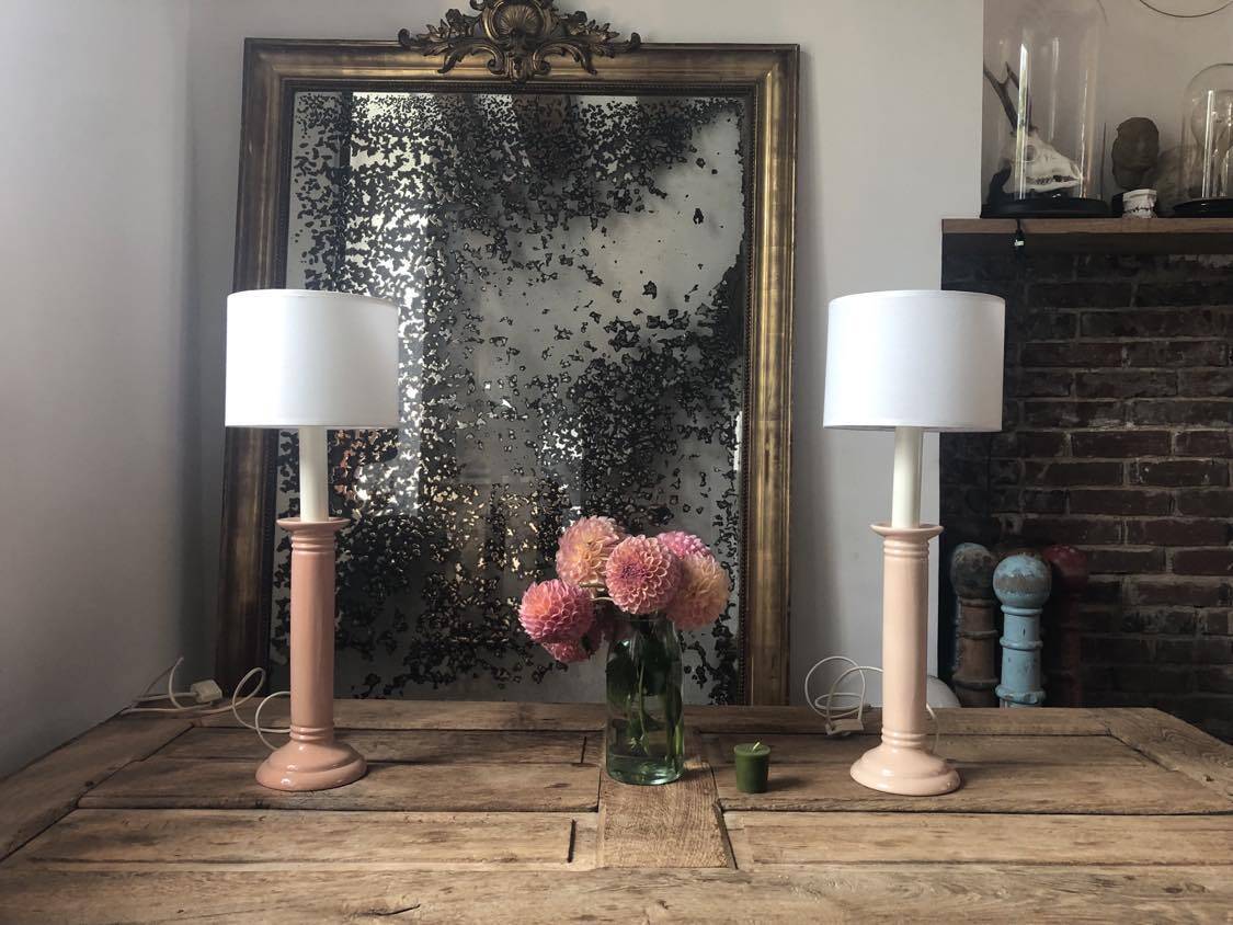 Pair of vintage salmon pink candlestick shaped ceramic lamp bases