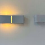 Pair of vintage wall lights, curved white metal, France 1980