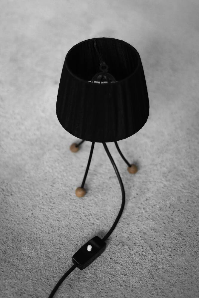 Small modern Polish table lamp from the mid-century with a black shade, 1960s.