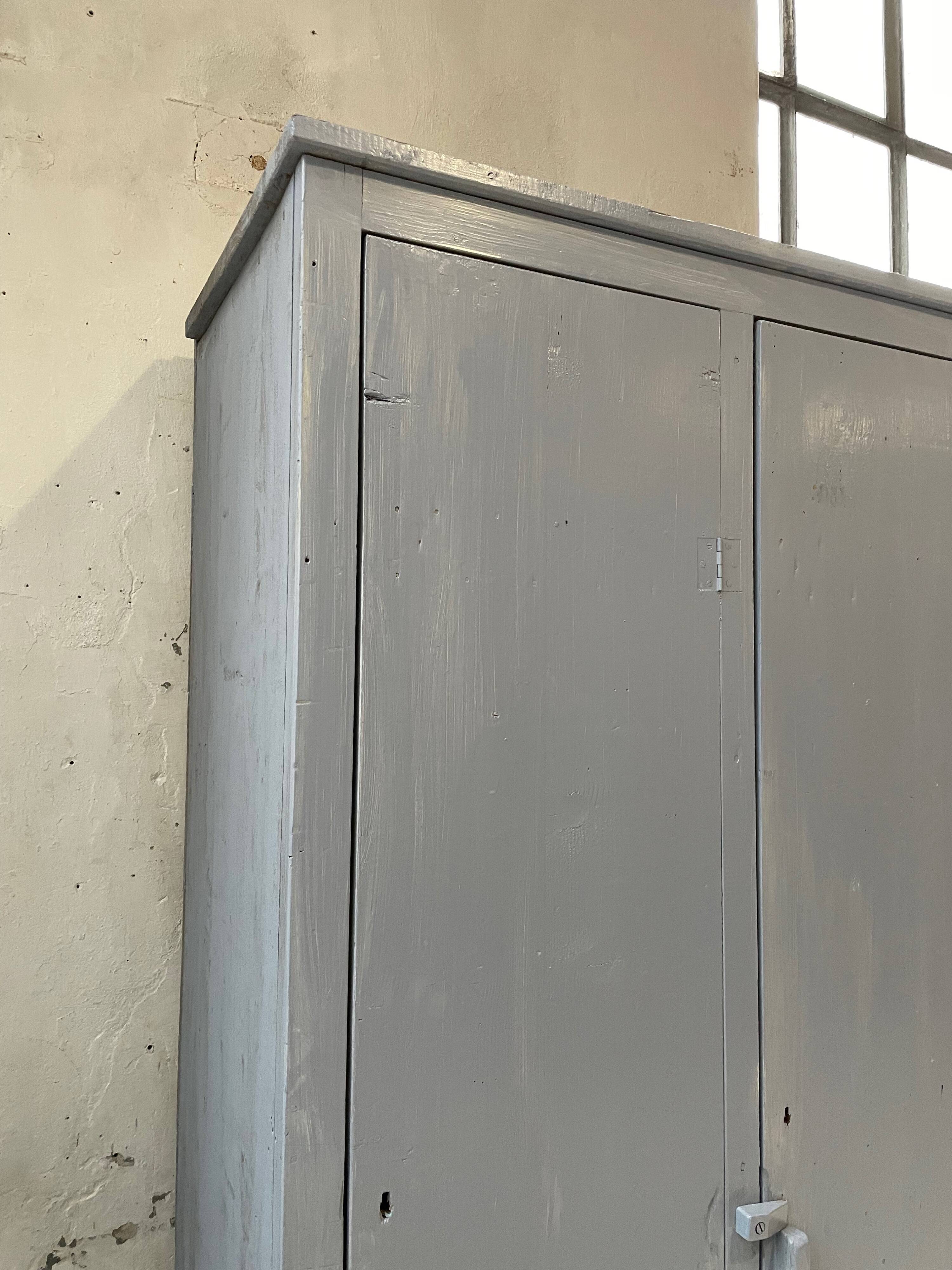 Blue patinated workshop furniture locker room