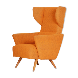 Fauteuil orange, fabriqué dans les années 1950 en Tchéquie