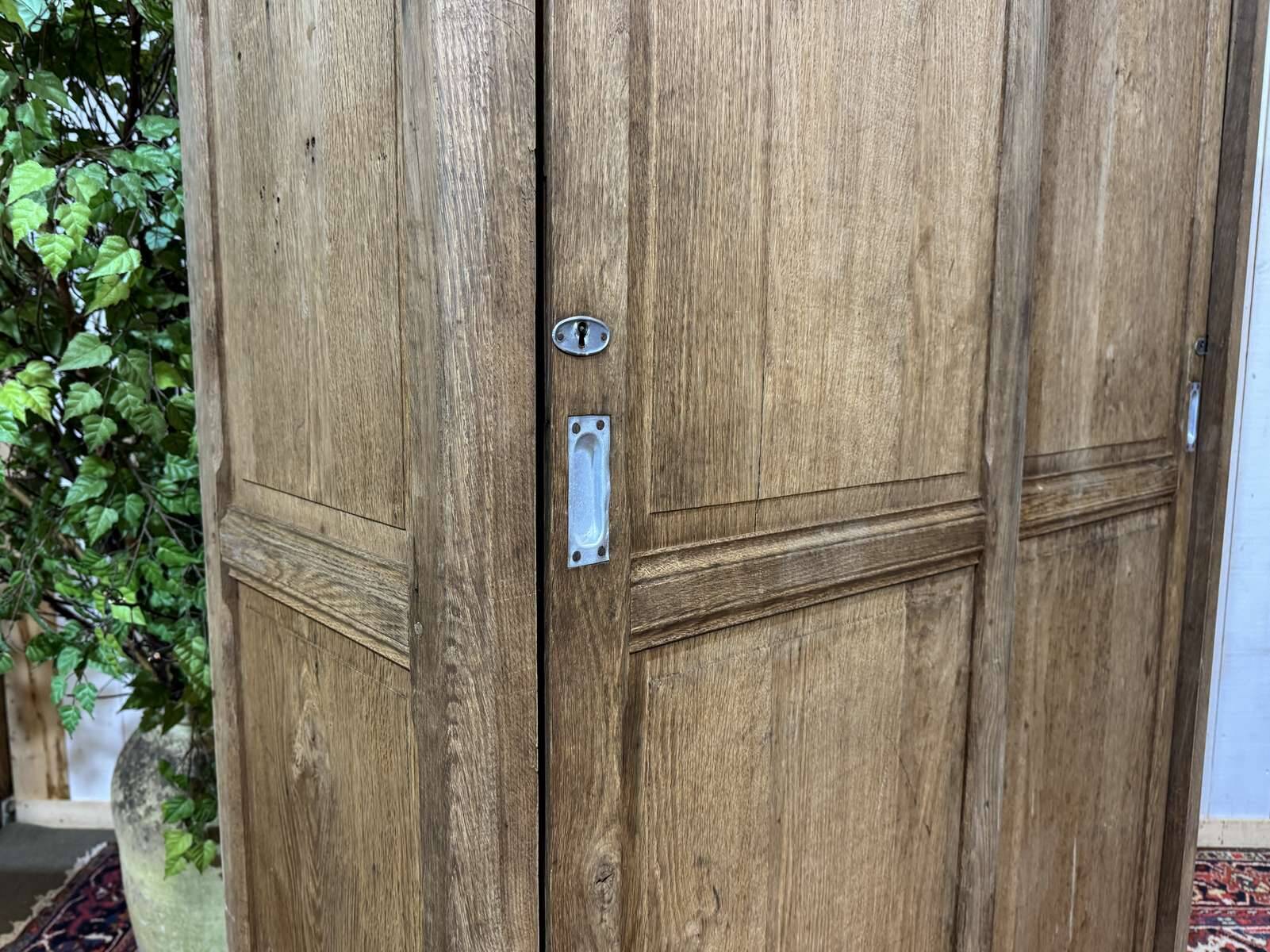 Oak wardrobe with sliding doors from the 1930s.