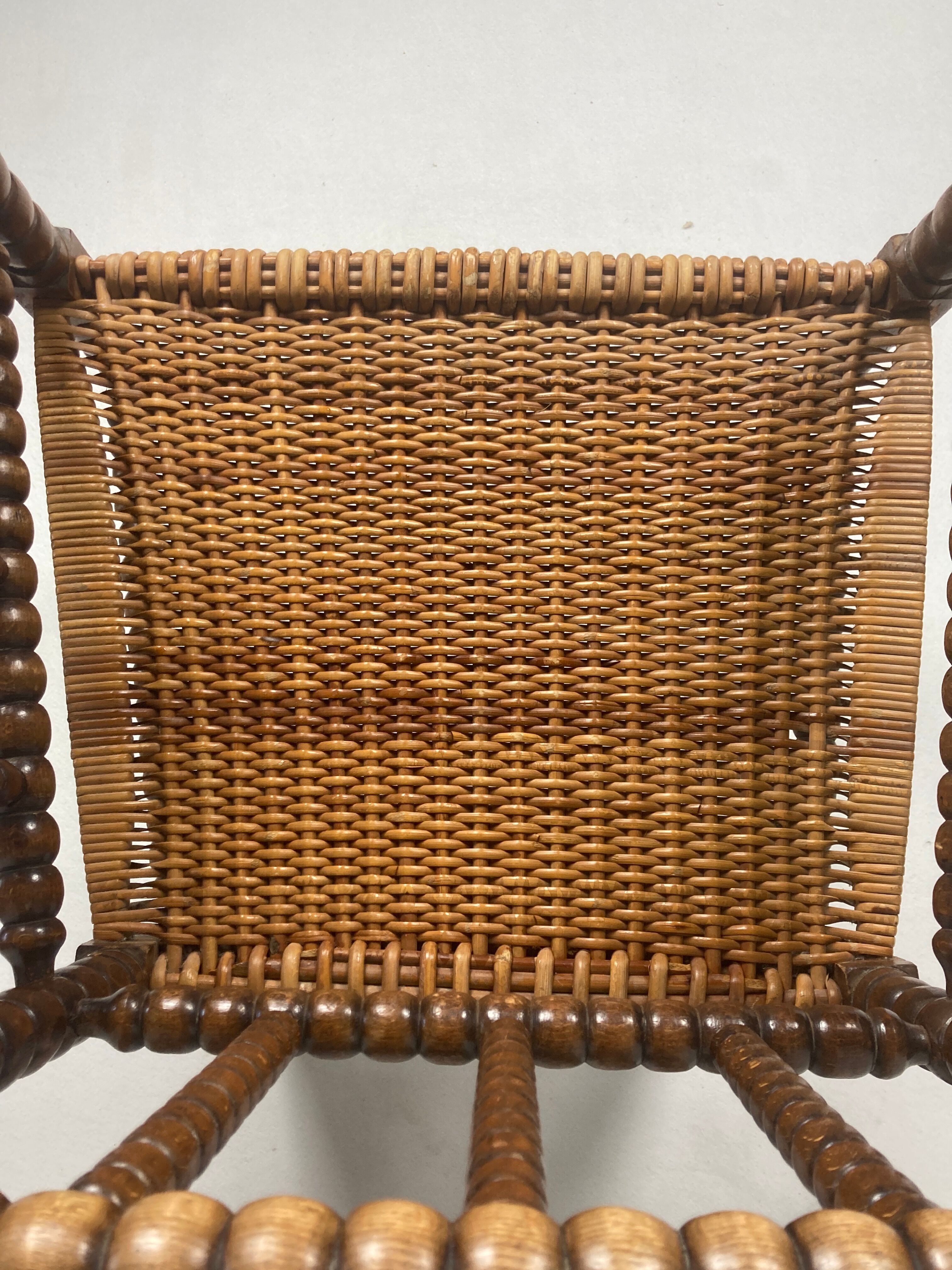 Fauteuil en osier et en bois tourné, années 1930 - 1950