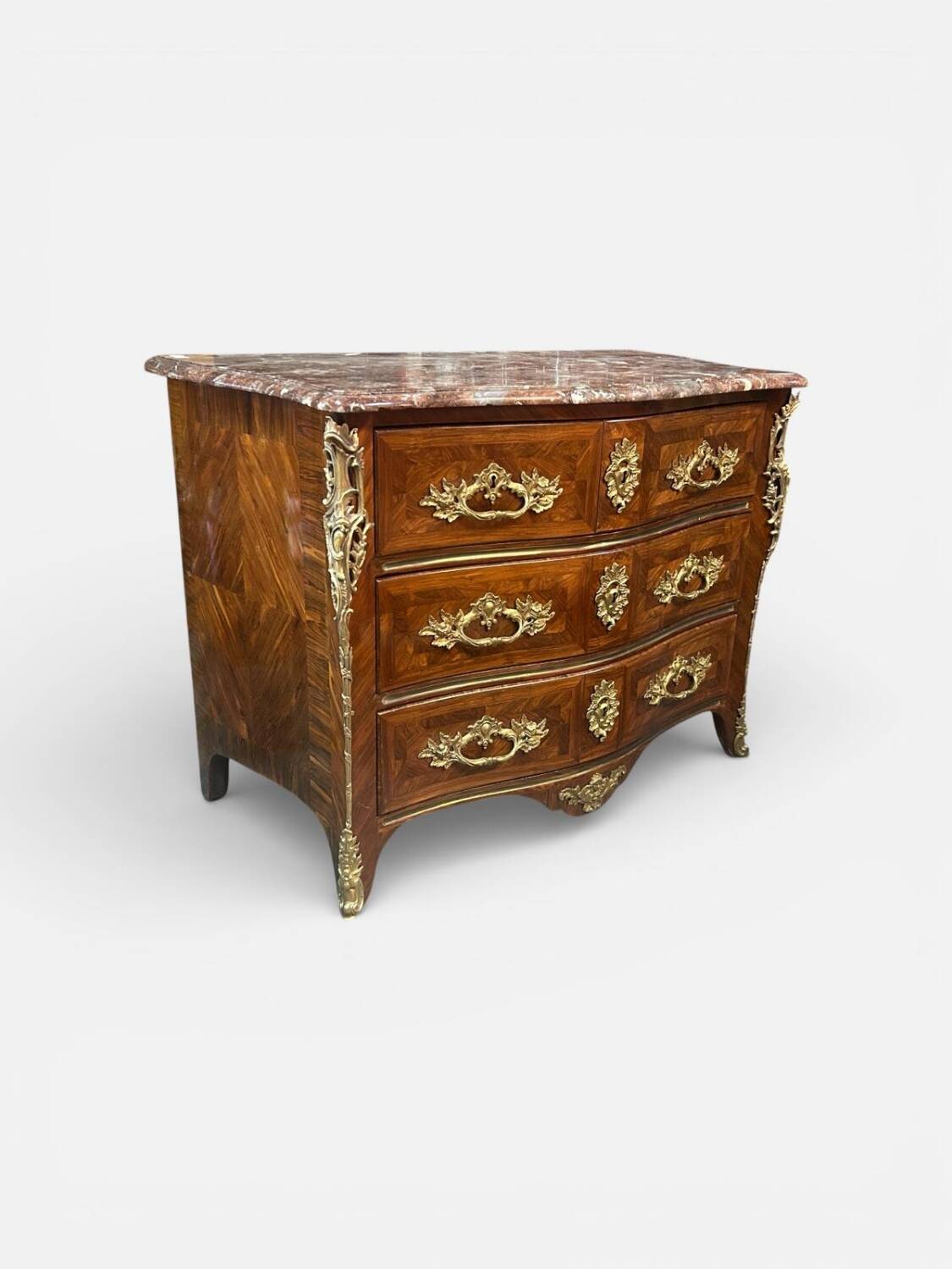 Louis XV period commode with violet wood veneer.