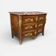 Louis XV period commode with violet wood veneer.