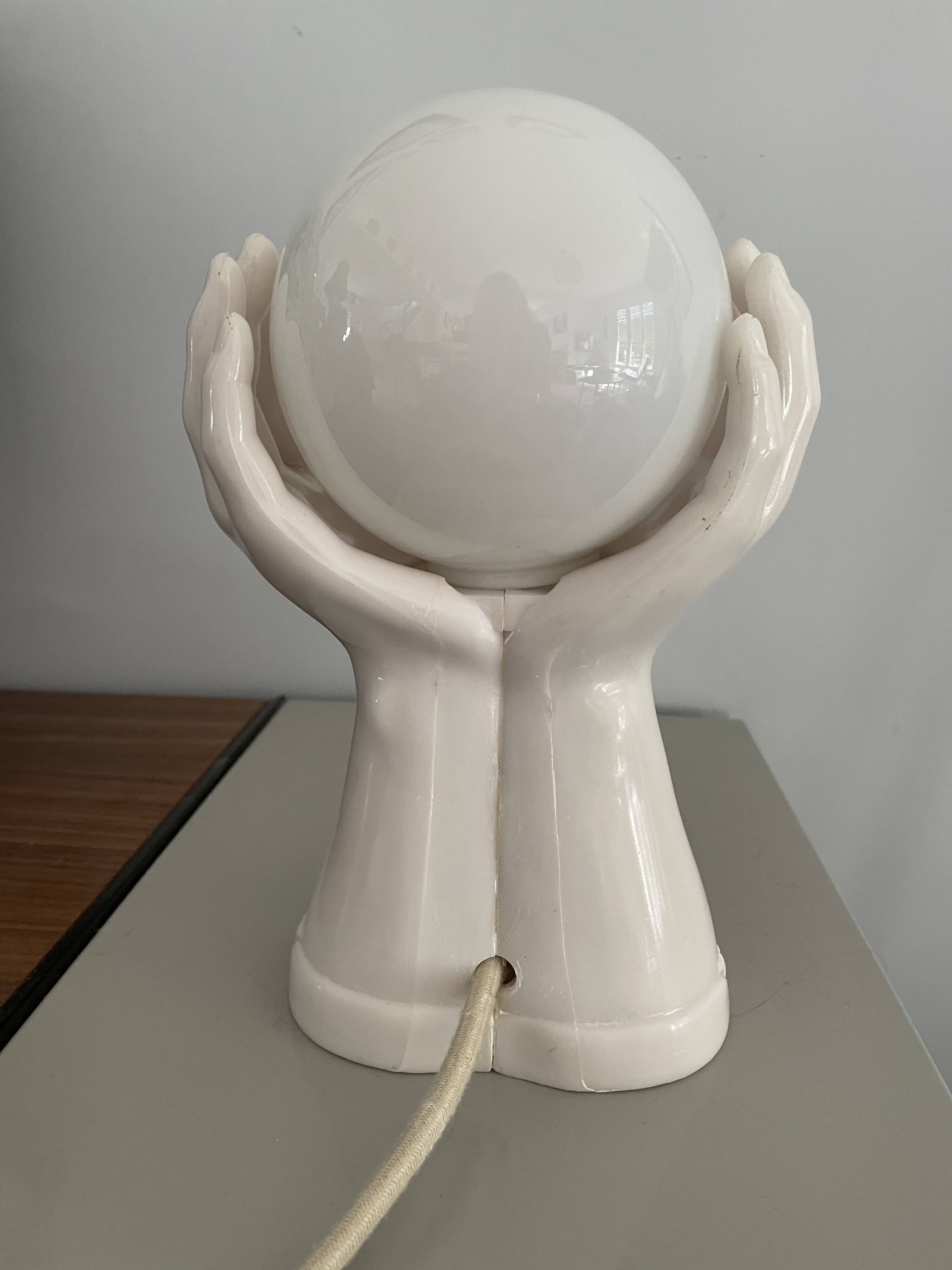 Resin hand-shaped table lamp