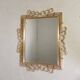 Vintage faceted mirror in an aluminium frame