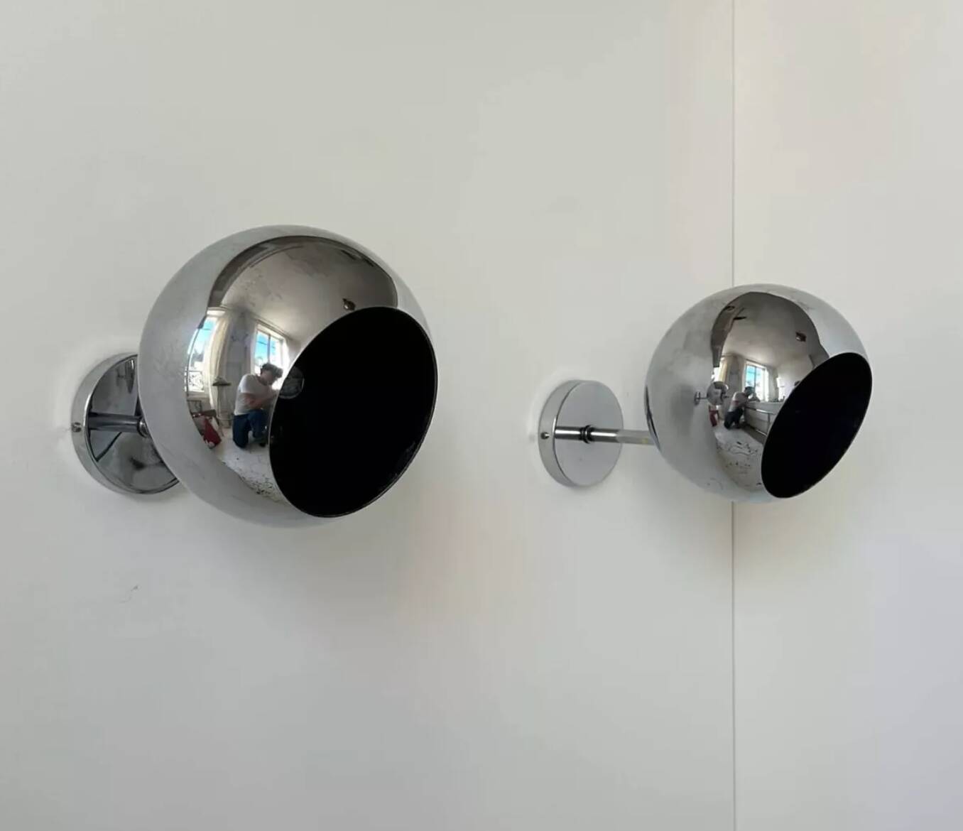 Pair of adjustable wall lights, chromed metal, France 1970