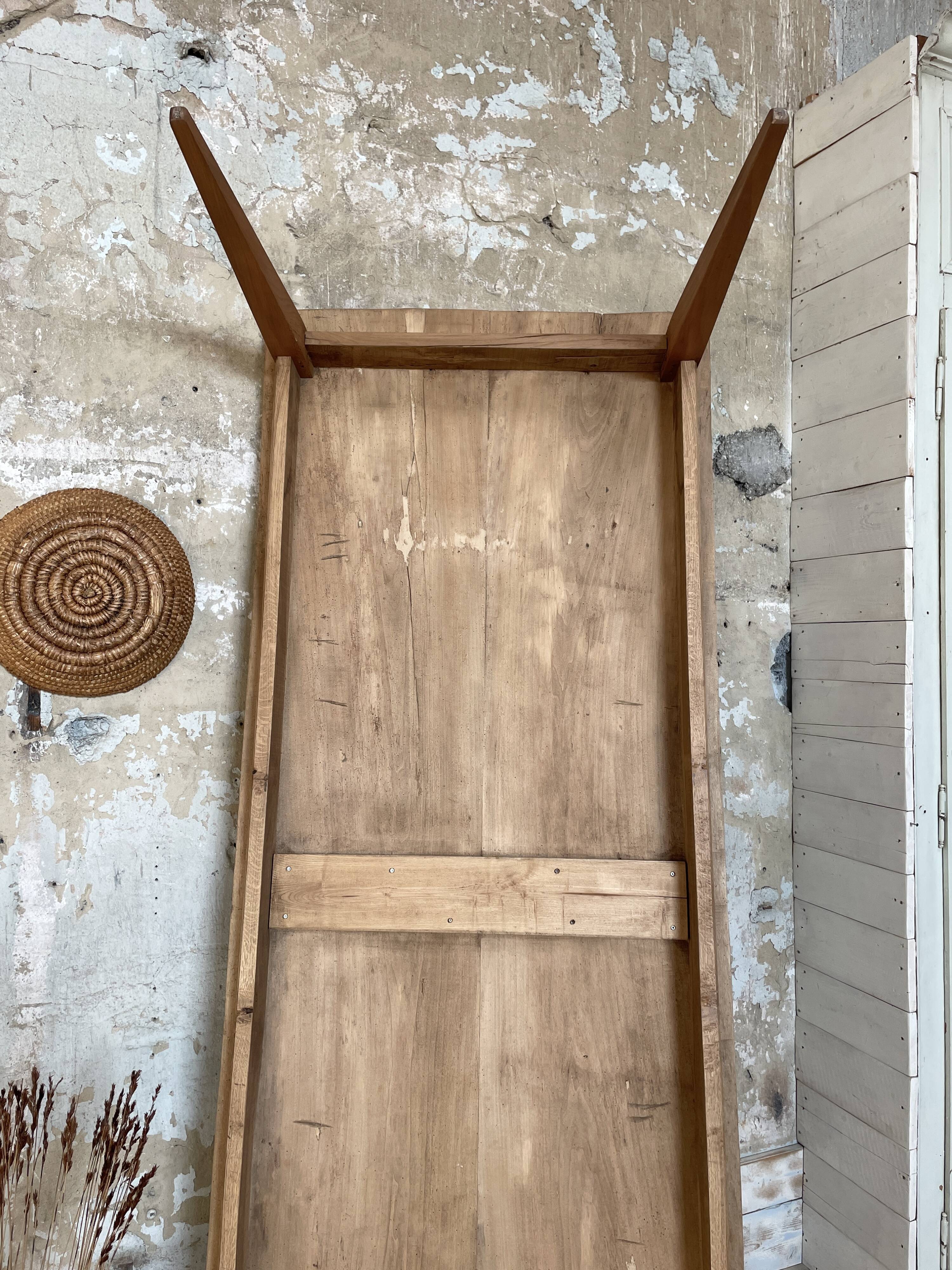 Vintage farm table with spindle legs.