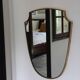Brass mirror with crest, bead frieze, Italian design style.