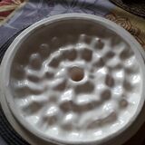 Glazed ceramic dessert plate with strawberry design.