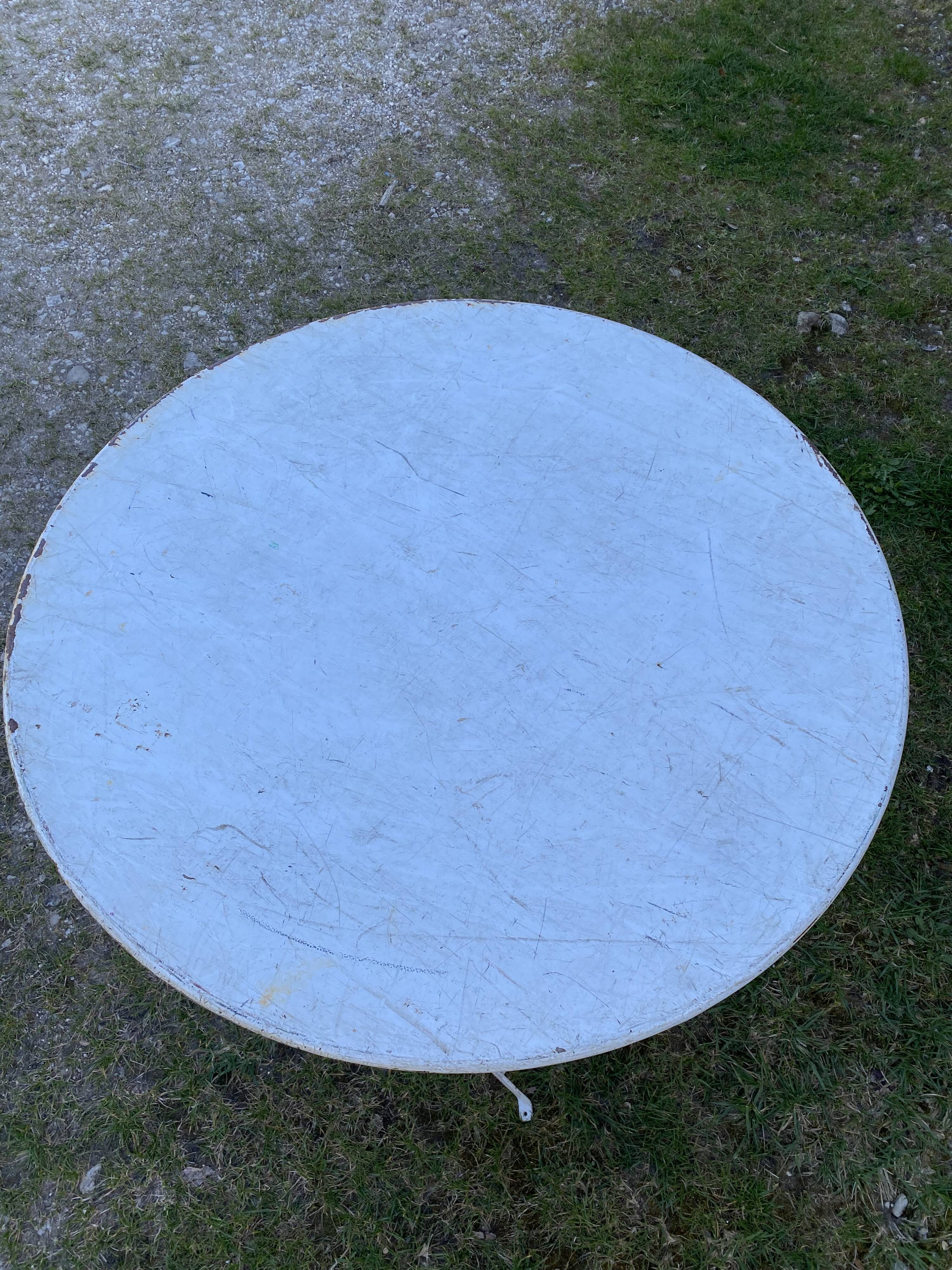 Round folding metal table – circa 1950