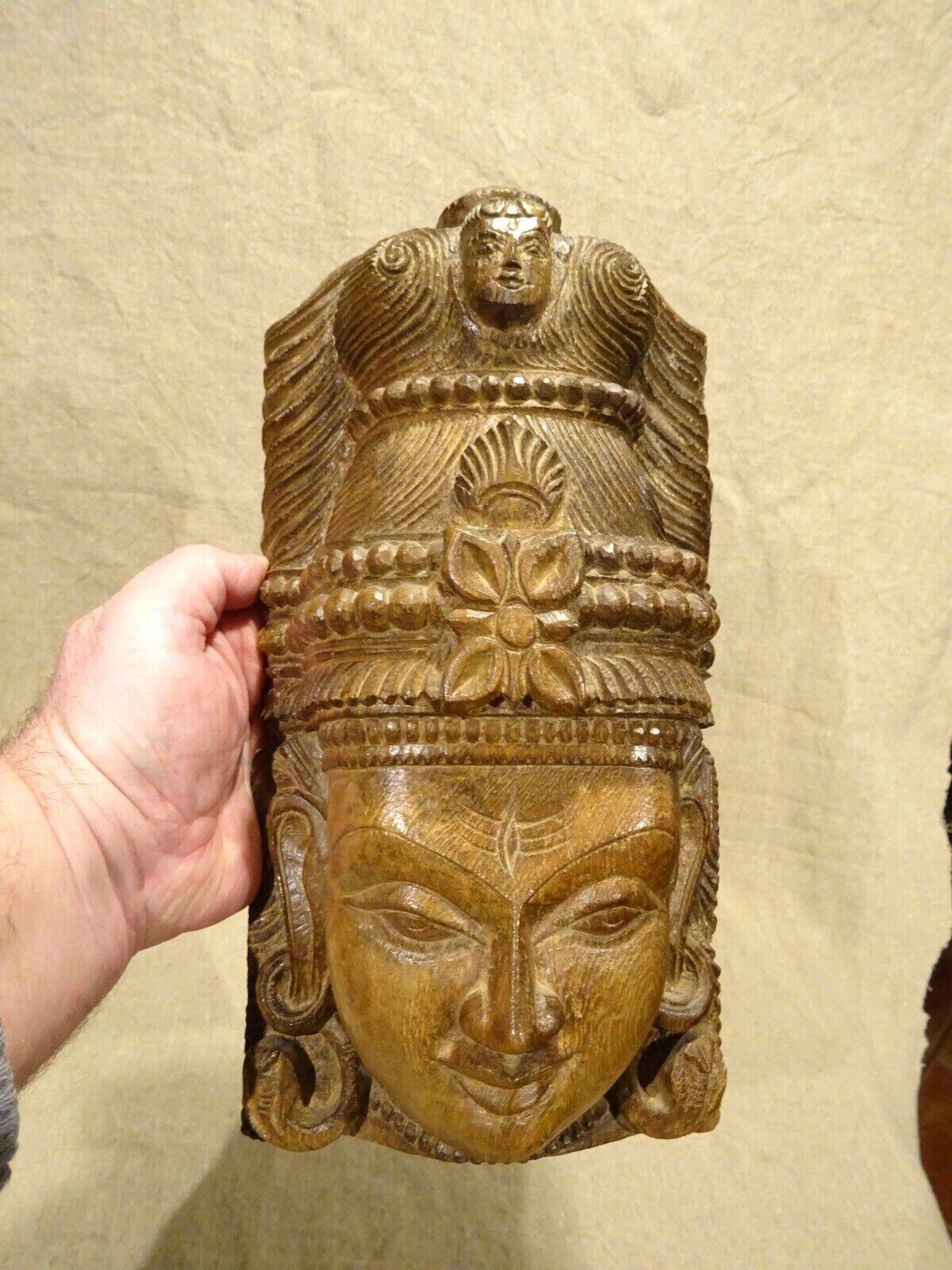 Hindu Shiva mask head wooden sculpture?