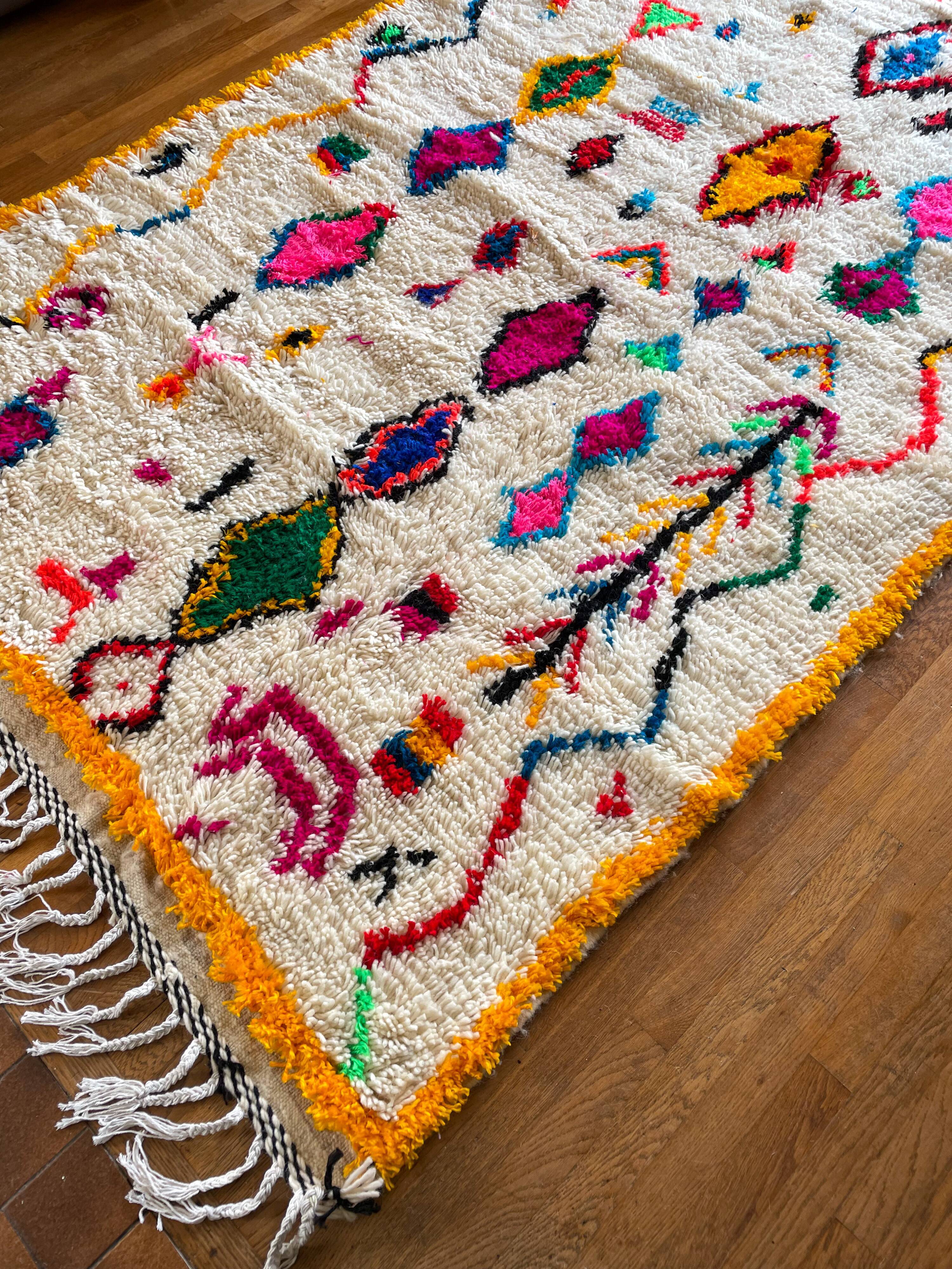 Berber carpet azimuth colored white with multicolored and fluorescent patterns
