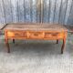 Antique solid cherry farmhouse table with 3 drawers and 2 pulls