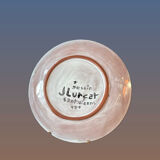 Terracotta plate, Jean Lurçat decorated with a character on a white background.