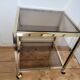Gold metal and smoked glass serving trolley
