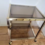 Gold metal and smoked glass serving trolley