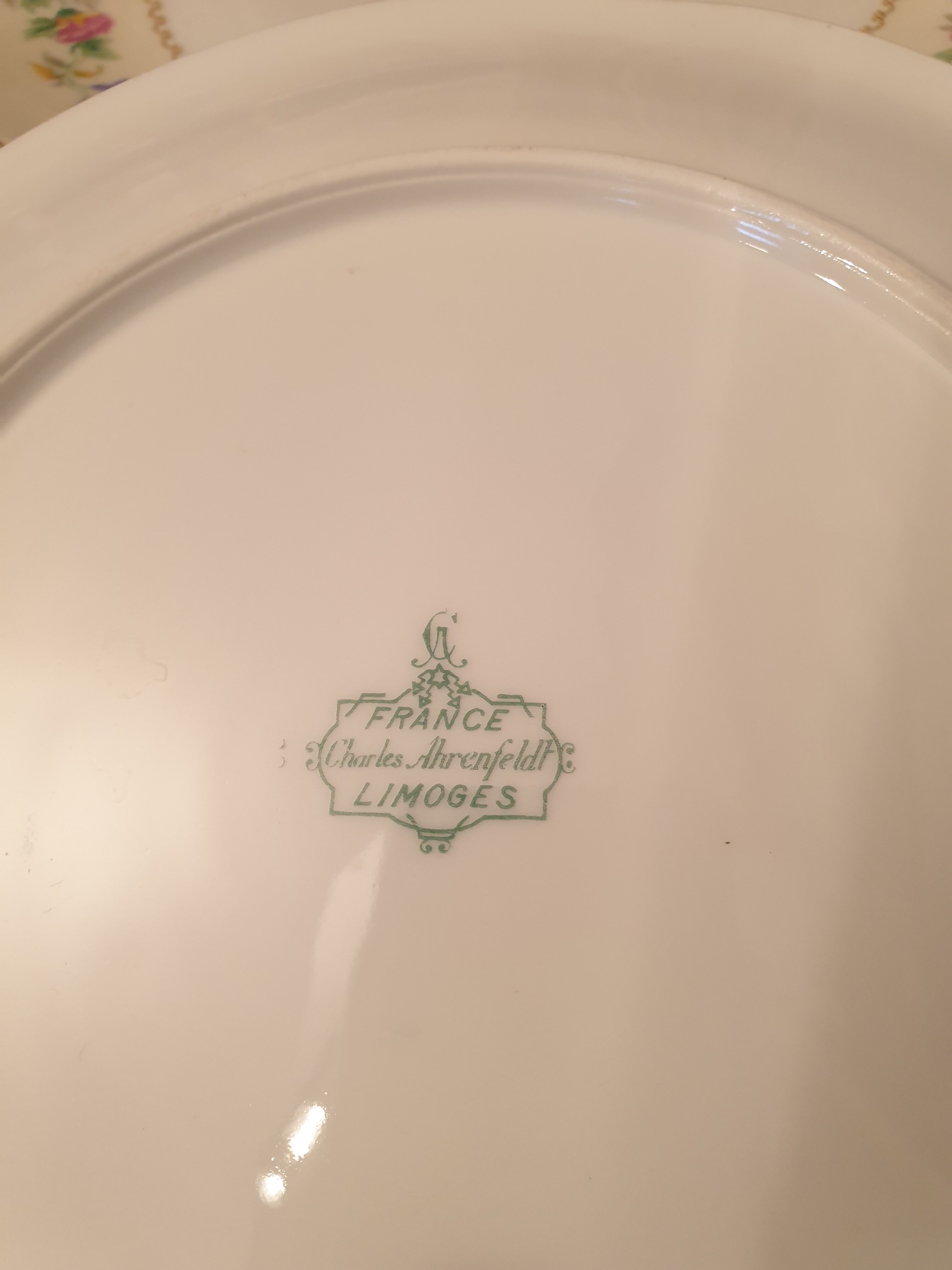 Suite of 4 flat plates Limoges