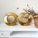 Round mirrors strapping in vintage gilded brass