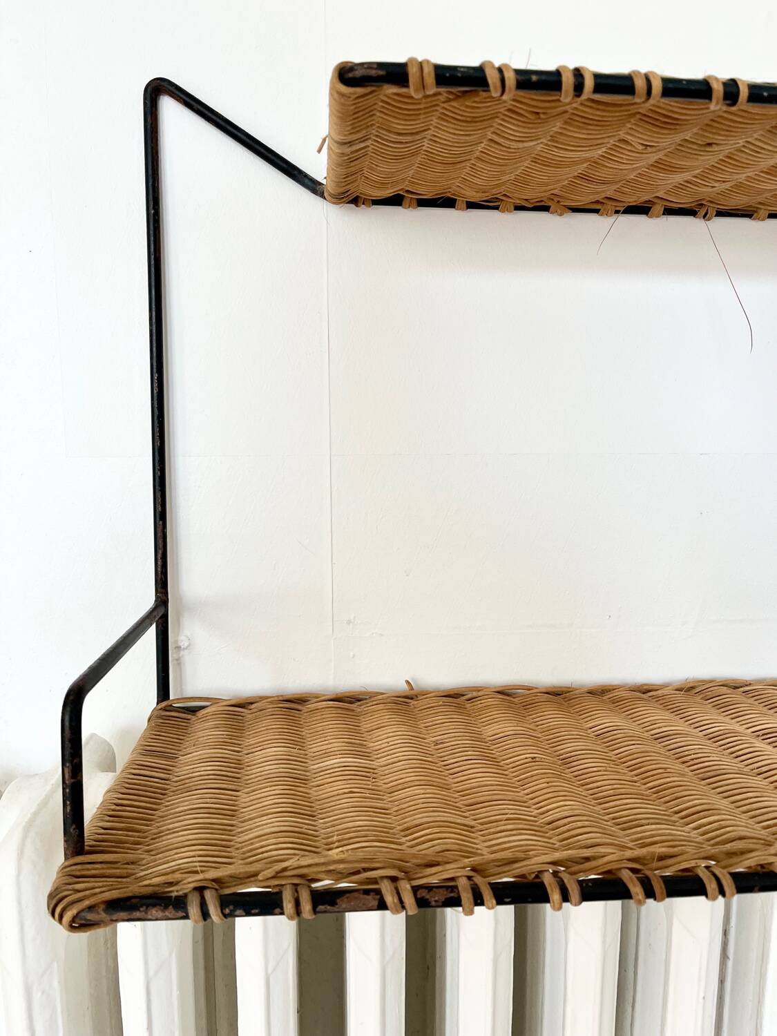 Raoul Guys rattan wall shelf 1950