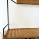 Raoul Guys rattan wall shelf 1950