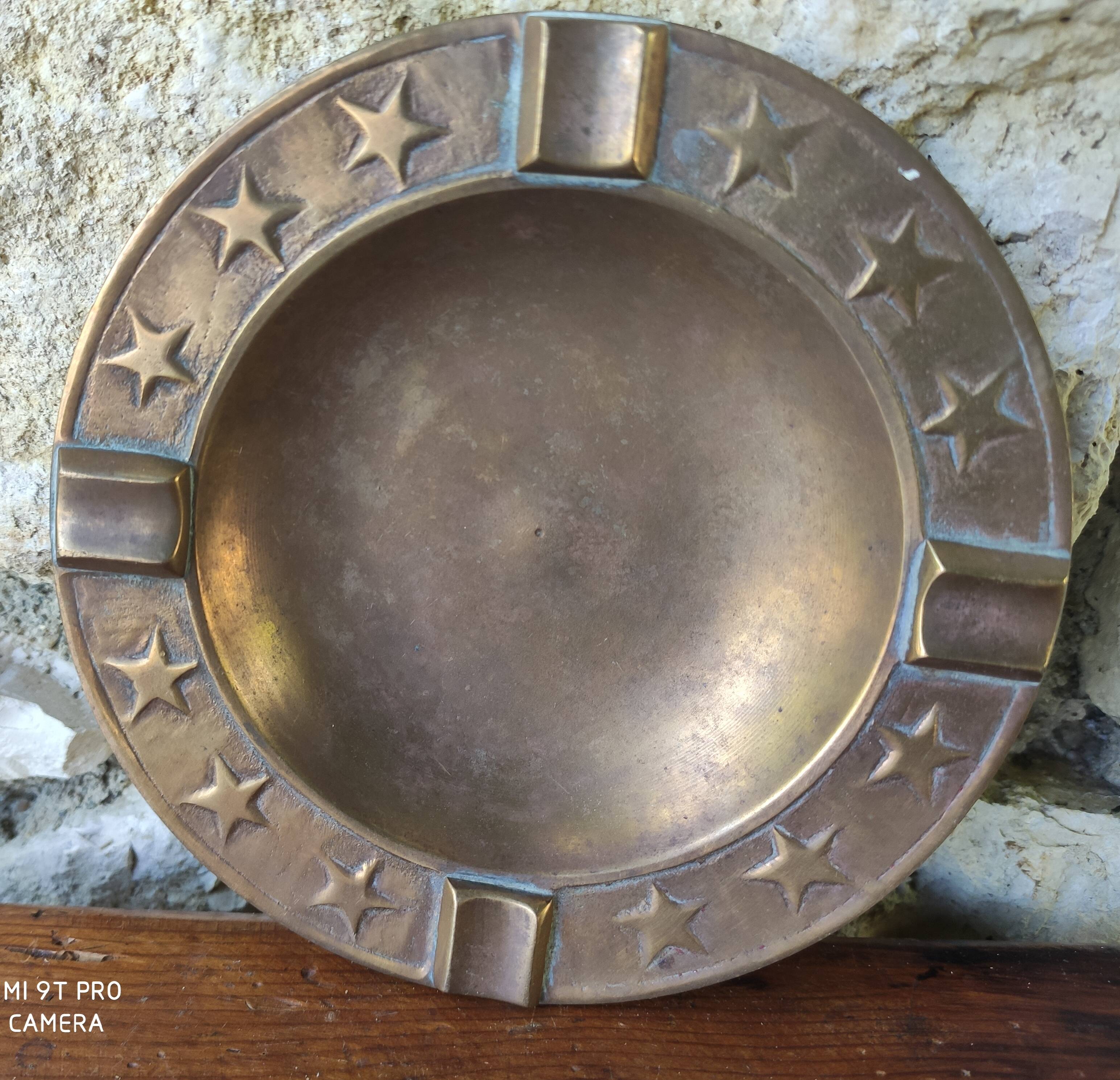 Brass ashtray with stars