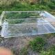 Coffee table in plexiglass and brass.