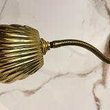 Articulated shell wall light