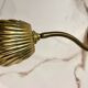 Articulated shell wall light
