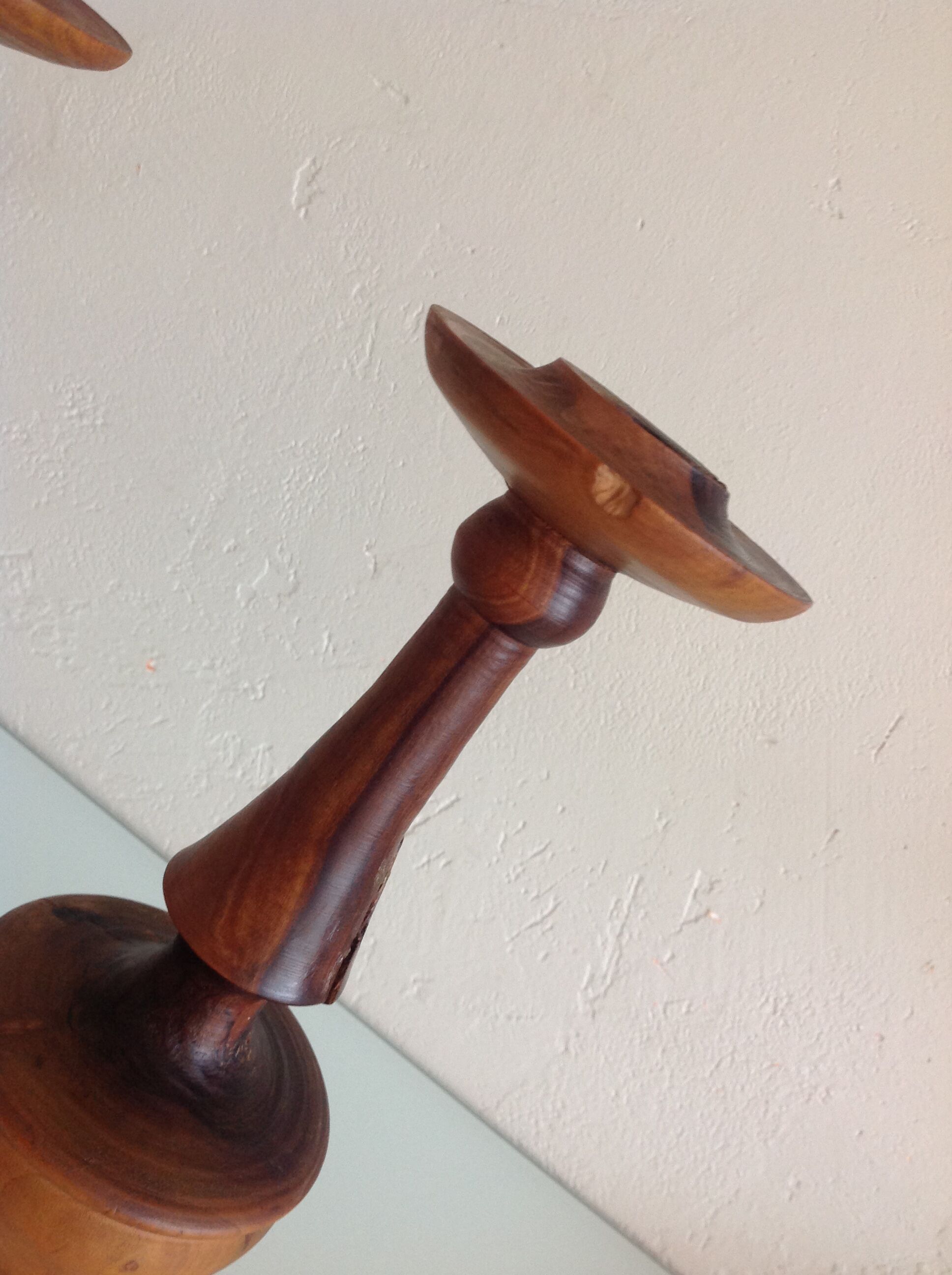 Pair of raw wood candlesticks