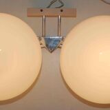 Pair of 60s wall lights in metal and opaline