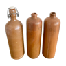 Trio de bouteilles en grès anciennes