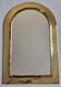 Arched wall mirror from Moroccan craftsmanship, made of metal.