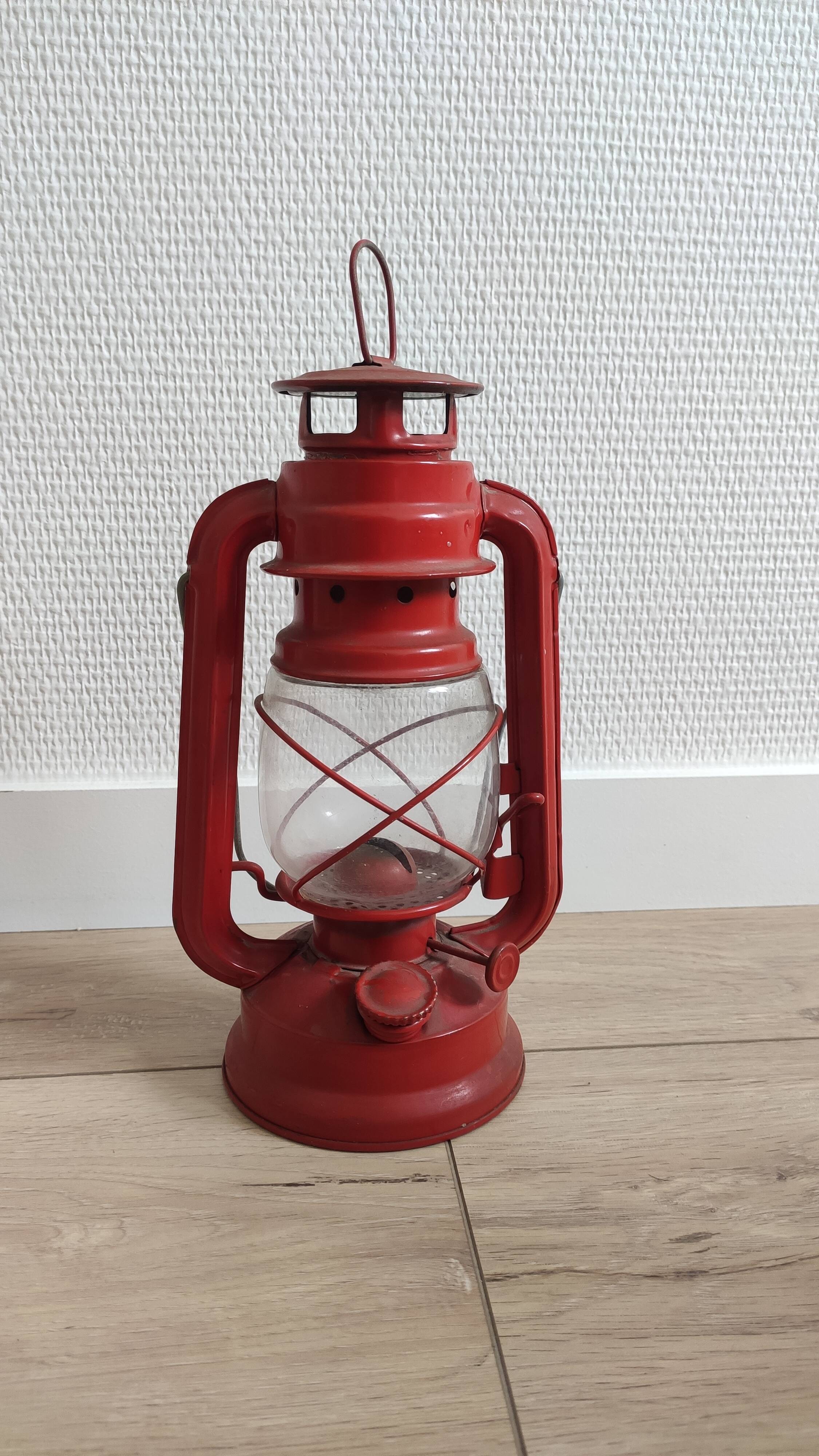 Vintage red retro patinated kerosene lamp