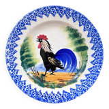 Old plate with rooster decoration