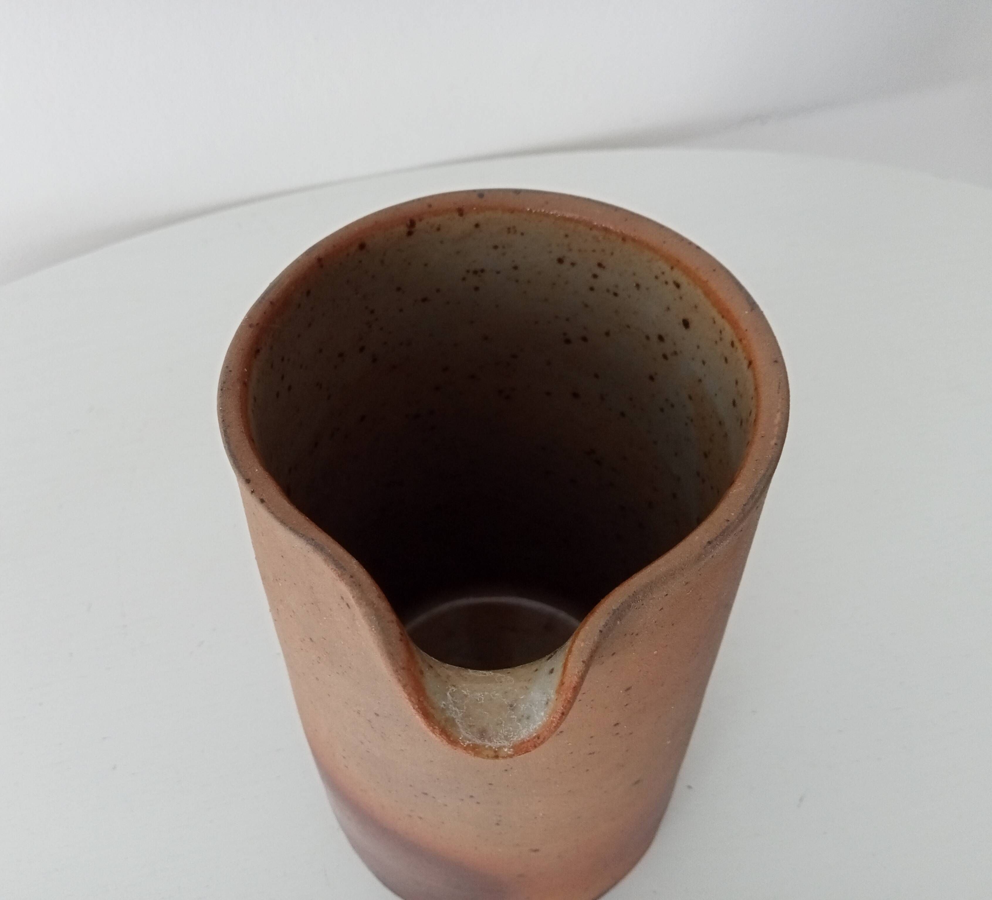 Antique stoneware pitcher