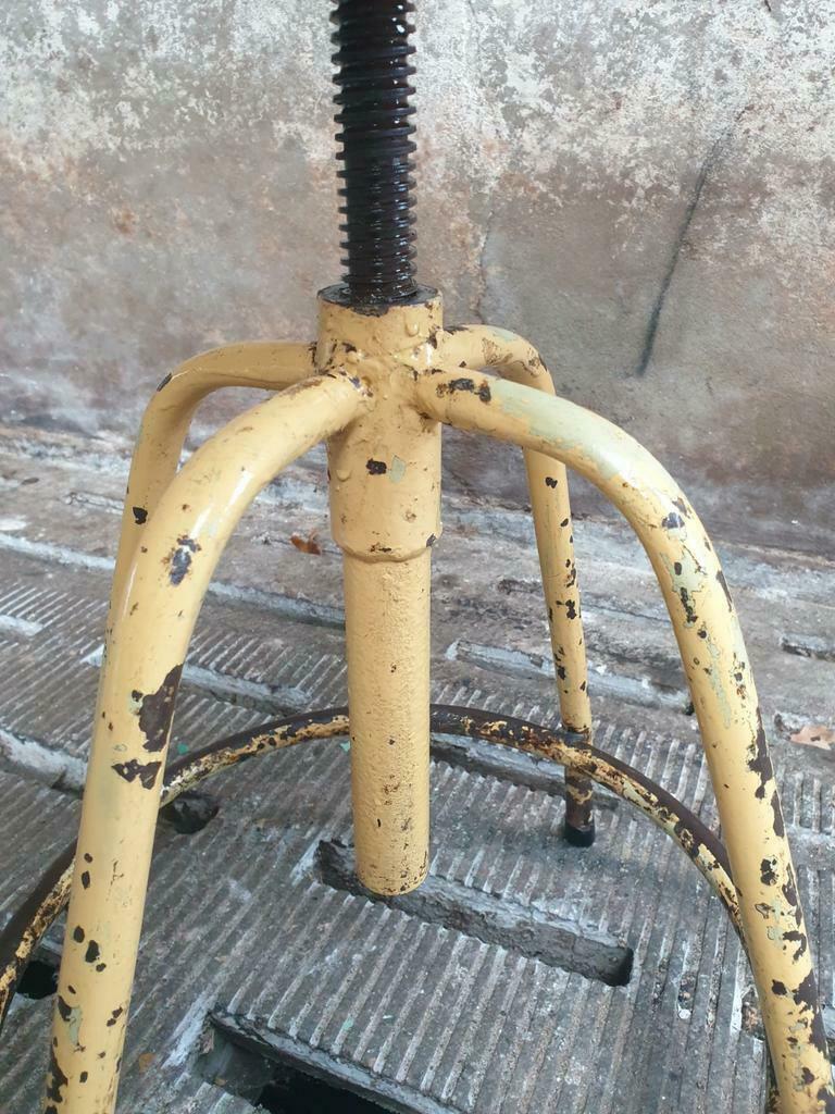 Industrial swivel stool side table