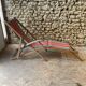 Red and green striped wooden deckchair