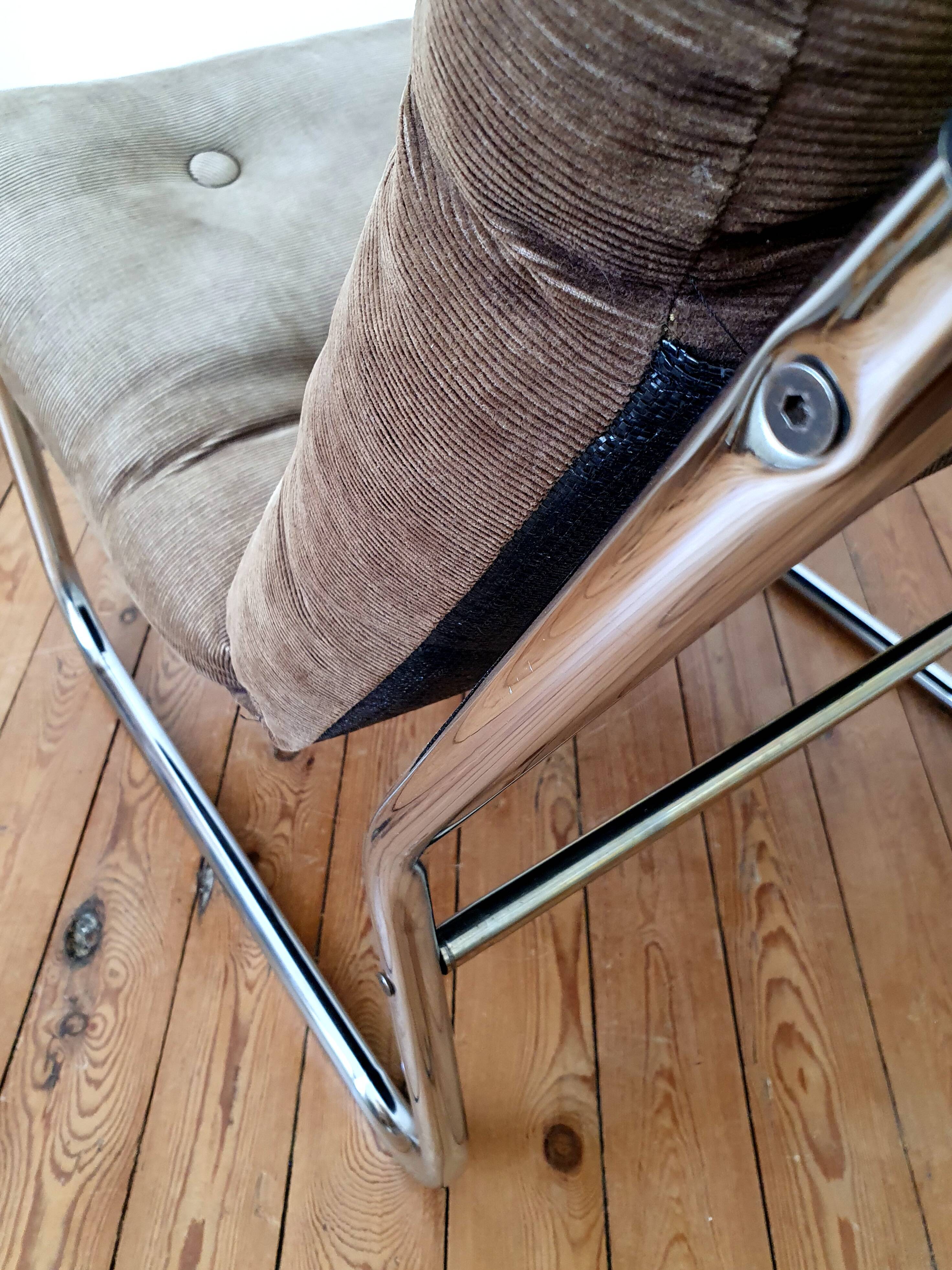 Vintage tubular chrome and velvet armchair