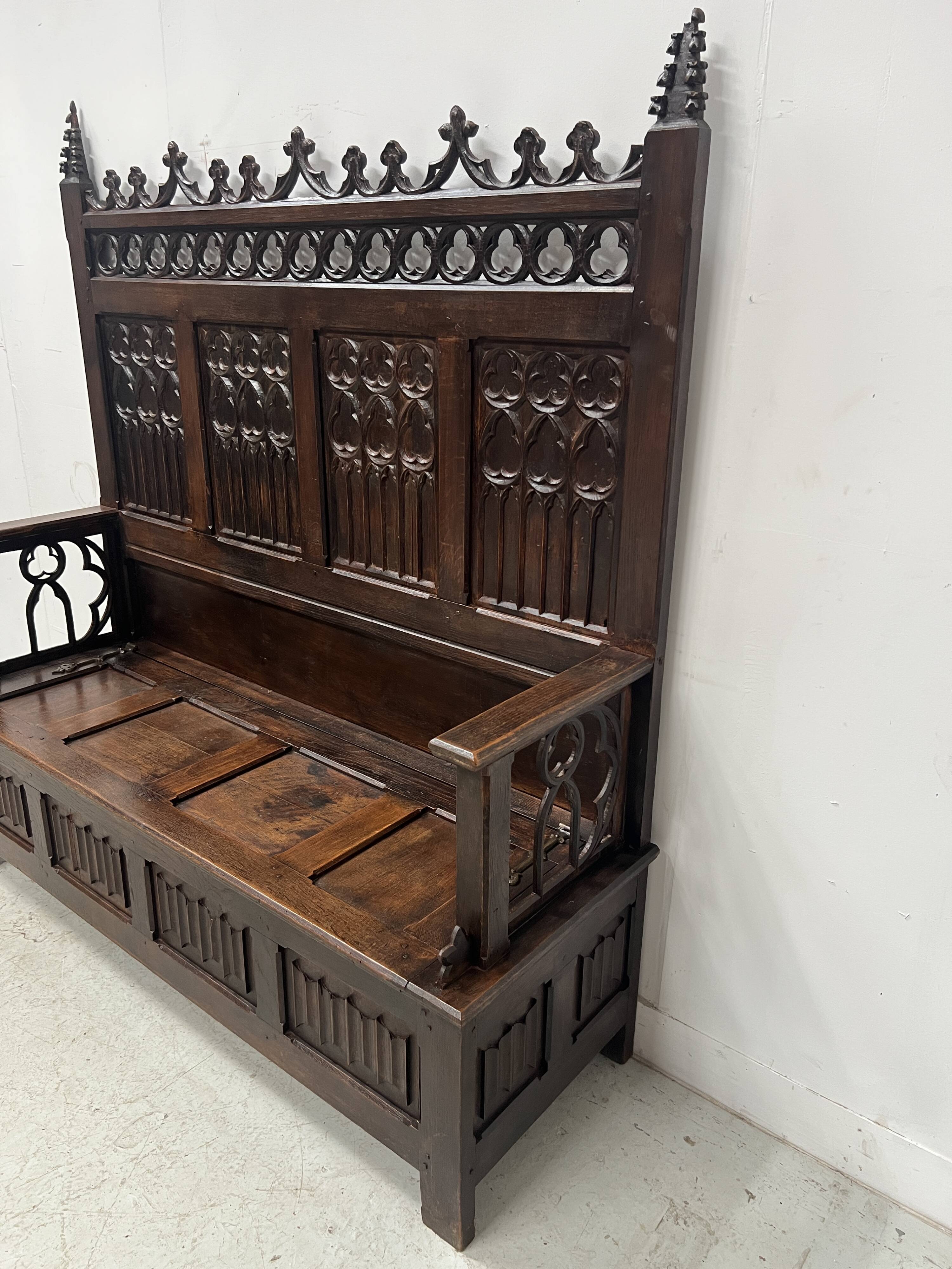 Gothic style carved oak chest bench, 19th century